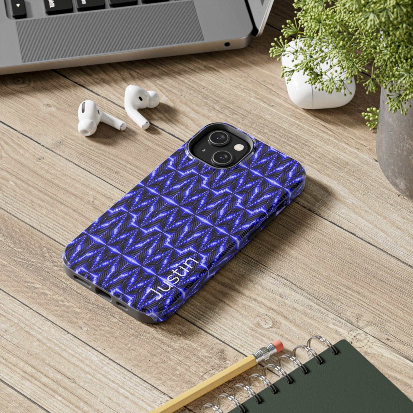 Tough phone case with electric blue geometric pattern and durable shock-absorbing design