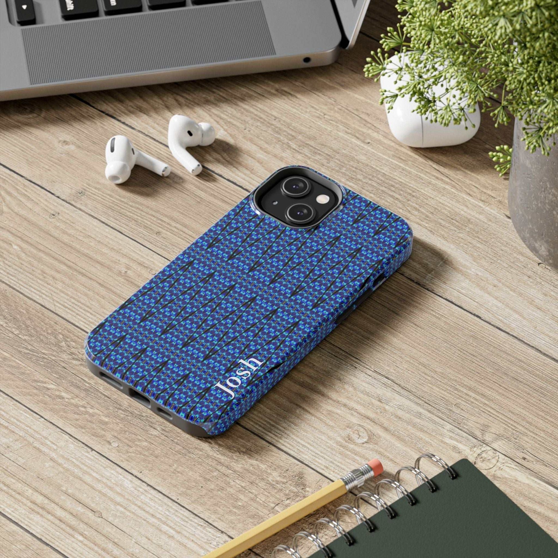 Slim blue geometric tough phone case with glossy finish and rubber liner for iPhone protection