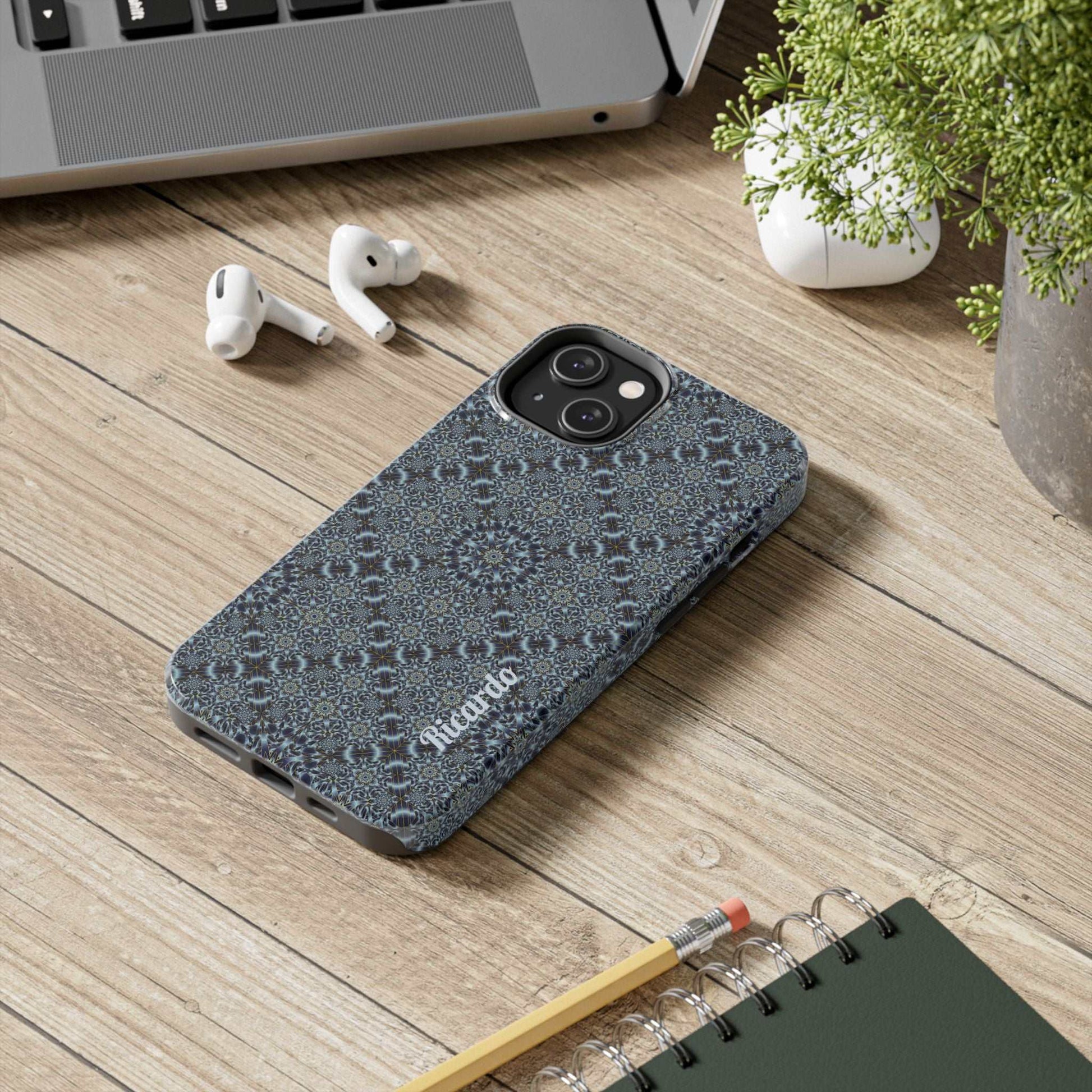 Protective phone case with blue mosaic mandala design and glossy finish