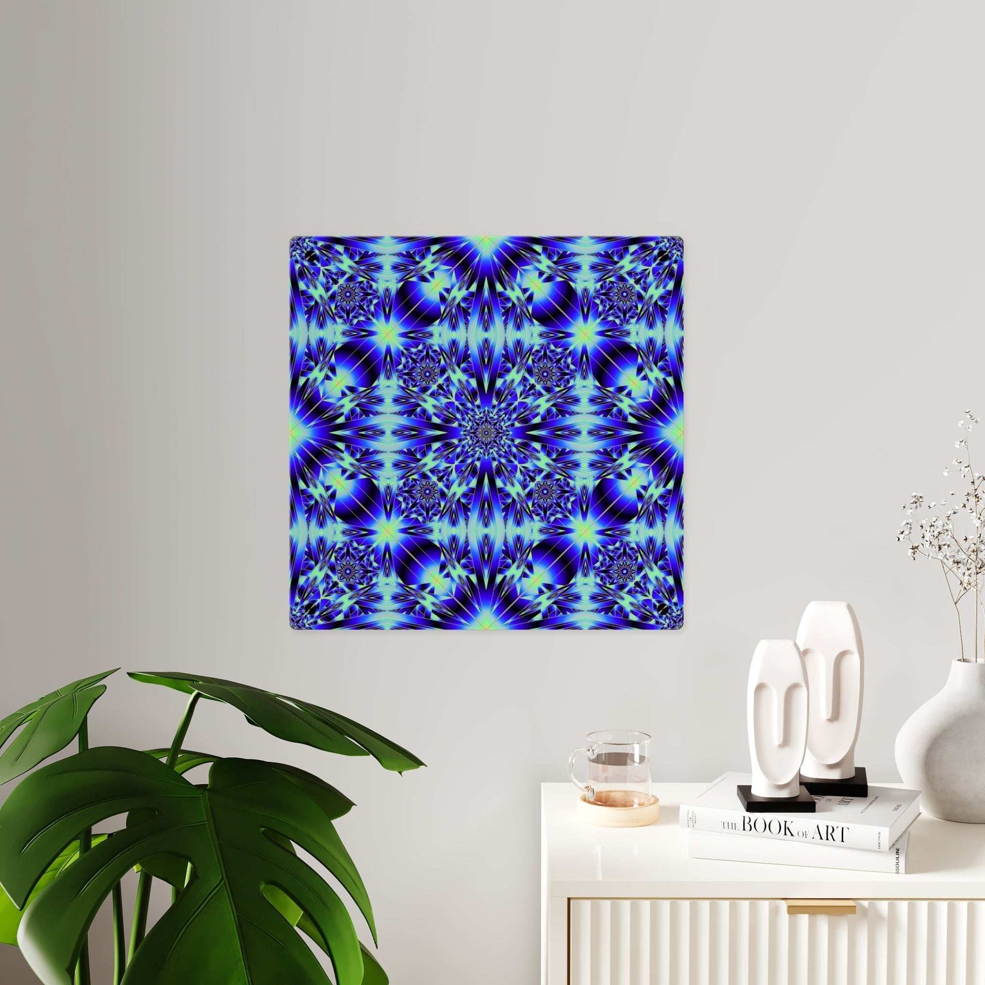 Blue kaleidoscope acrylic wall art panel with geometric starburst design and brushed silver stand-offs