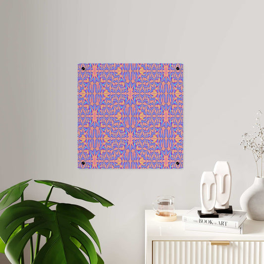 Acrylic wall art panel with pink and blue geometric kaleidoscope pattern on clear acrylic with brushed silver stand-offs